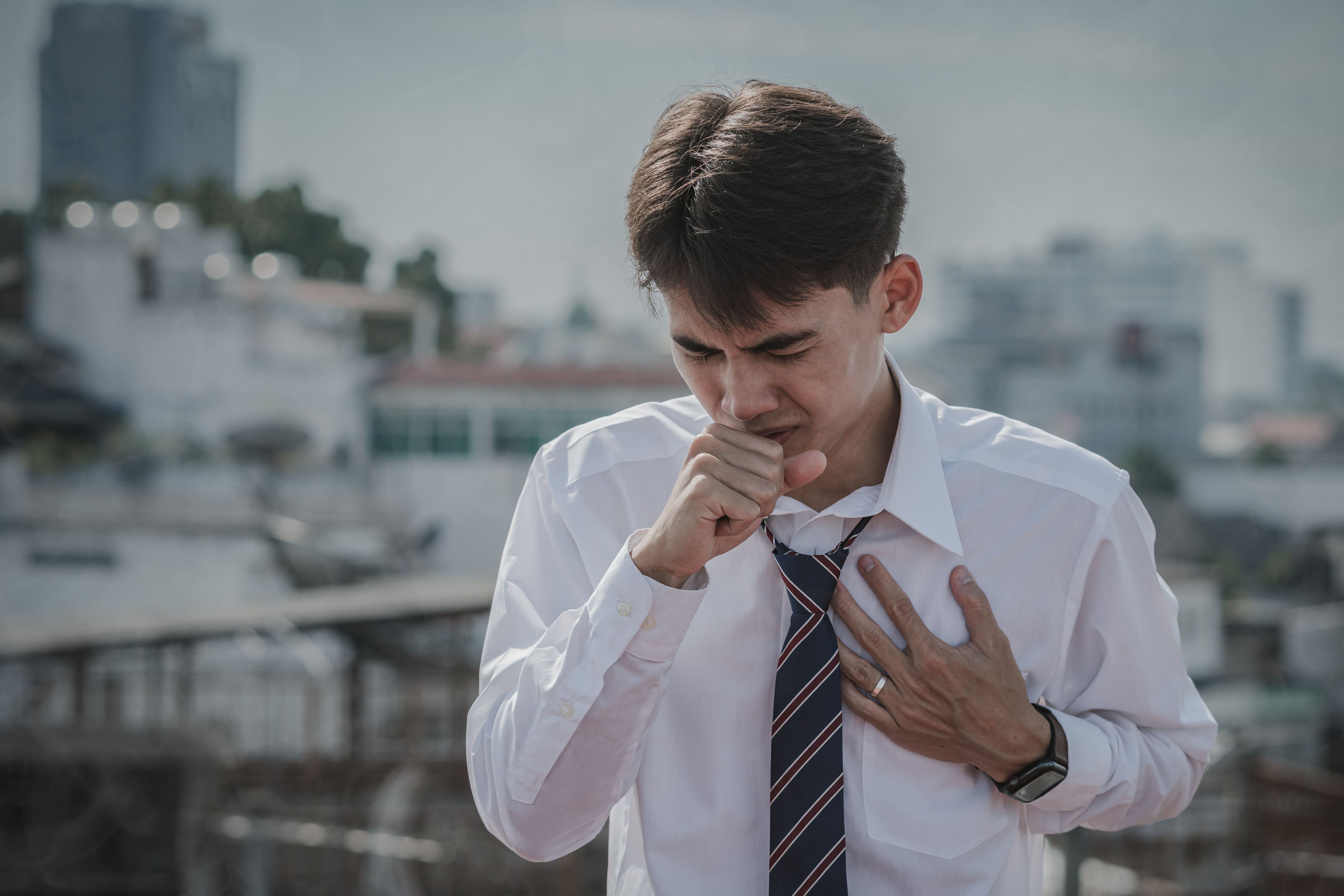 asian-young-man-coughing-on-pm-2-5-dust-and-air-po-2024-11-27-15-49-06-utc (1).jpg